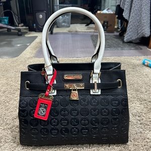 Gorgeous, black and white Nicole Lee handbag with gold padlock. Brand new.
